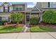 Charming two-story townhome with well-manicured front yard and inviting entrance at 105 Brockman Way, Goose Creek, SC 29445