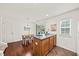 Kitchen featuring an island and adjacent eating area with sliding glass doors to backyard at 105 Brockman Way, Goose Creek, SC 29445