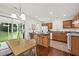 Eat-in kitchen with island and seating with sliding glass doors to patio at 105 Brockman Way, Goose Creek, SC 29445