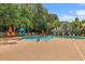 Community pool with lounge chairs and umbrellas at 105 Brockman Way, Goose Creek, SC 29445