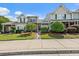 Charming townhouse exterior with well-maintained landscaping and inviting curb appeal at 105 Brockman Way, Goose Creek, SC 29445