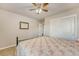Bedroom featuring a queen-sized bed, closet space, and neutral decor, providing a comfortable and functional living area at 109 Cypress Plantation Rd, Moncks Corner, SC 29461