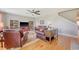 Comfortable living room featuring wood floors, a ceiling fan, and lots of natural light at 109 Cypress Plantation Rd, Moncks Corner, SC 29461