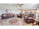 Open concept living room featuring hardwood floors and ample seating at 109 Cypress Plantation Rd, Moncks Corner, SC 29461