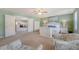 The lovely main bedroom features a sitting area, and opens into a connecting room at 109 Cypress Plantation Rd, Moncks Corner, SC 29461