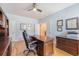 Well-lit office with hardwood floors, ample storage, and a comfortable work environment at 109 Cypress Plantation Rd, Moncks Corner, SC 29461