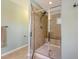 This spacious walk-in shower features stylish tile and a bench seat at 109 Cypress Plantation Rd, Moncks Corner, SC 29461