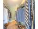 This spacious walk-in closet has plenty of storage space and custom shelving at 109 Cypress Plantation Rd, Moncks Corner, SC 29461