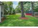 The backyard includes a lawn and mature trees at 110 Bayberry Run, Summerville, SC 29485