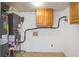 This basement features utilities, cabinetry, and tiled flooring at 110 Bayberry Run, Summerville, SC 29485