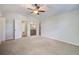 Spacious bedroom with neutral tones, ceiling fan, and ensuite bathroom at 110 Bayberry Run, Summerville, SC 29485