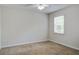This bedroom features a ceiling fan, carpet, and window with blind at 110 Bayberry Run, Summerville, SC 29485