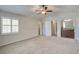 Carpeted primary bedroom with ensuite bath, ceiling fan, and great light at 110 Bayberry Run, Summerville, SC 29485