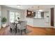 Bright dining area with sliding glass doors to the backyard and a modern table and chairs at 110 Bayberry Run, Summerville, SC 29485