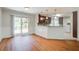 Bright dining area with sliding glass doors to the backyard and hardwood floors at 110 Bayberry Run, Summerville, SC 29485