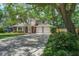 Charming two-story home boasts a brick facade, a two-car garage and a large, mature shade tree at 110 Bayberry Run, Summerville, SC 29485