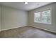 Inviting bedroom with a large window and neutral-toned walls, creating a serene and calming atmosphere at 112 Lewisfield Dr, North Charleston, SC 29418