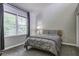 Cozy bedroom featuring a large window and neutral color palette for a relaxing atmosphere at 112 Lewisfield Dr, North Charleston, SC 29418
