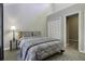 Stylish bedroom with vaulted ceiling, gray carpet, and a neutral color palette at 112 Lewisfield Dr, North Charleston, SC 29418