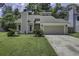 Charming single-Gathering home with a two-car garage and well-manicured lawn at 112 Lewisfield Dr, North Charleston, SC 29418