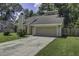 Charming single-Gathering home featuring a two-car garage, and mature landscaping at 112 Lewisfield Dr, North Charleston, SC 29418