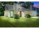 Charming single-Gathering home features a manicured lawn and attached two-car garage at 112 Lewisfield Dr, North Charleston, SC 29418