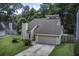 This charming single-Gathering home has an attached garage and lush front lawn at 112 Lewisfield Dr, North Charleston, SC 29418