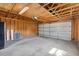 Spacious garage with an automatic door and ample storage space at 113 Amaranth Ave, Summerville, SC 29483