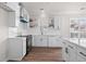 Modern kitchen featuring white cabinets, stainless steel appliances, and sleek countertops at 113 Amaranth Ave, Summerville, SC 29483