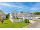 Landscaped yard with a white picket fence adds charm to this lovely home at 113 Amaranth Ave, Summerville, SC 29483