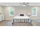 Spacious main bedroom with a ceiling fan, wood flooring, and lots of natural light at 113 Harvey Ave, Goose Creek, SC 29445
