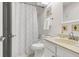 Bathroom featuring a shower-tub combo, white vanity, and decorative seashell accents at 1136 Shadow Lake Cir, Mount Pleasant, SC 29464