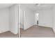 Bright bedroom featuring a ceiling fan, access door, and plush carpeting, freshly painted in white at 1136 Shadow Lake Cir, Mount Pleasant, SC 29464