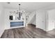 Open concept living and dining area with view of staircase and kitchen at 1136 Shadow Lake Cir, Mount Pleasant, SC 29464