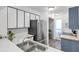 A kitchen with stainless steel appliances and a stainless steel sink with white tile countertops at 1136 Shadow Lake Cir, Mount Pleasant, SC 29464