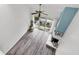 Bright living room featuring stylish gray floors, a cozy fireplace, and sliding glass doors to the patio at 1136 Shadow Lake Cir, Mount Pleasant, SC 29464