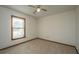 Bedroom featuring tan carpet, neutral paint, ceiling fan and natural light at 115 W Park Ln, Summerville, SC 29486