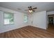 Bedroom featuring updated wood look laminate flooring and neutral paint at 115 W Park Ln, Summerville, SC 29486