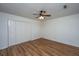 Bedroom featuring a closet, ceiling fan, and wood-look laminate flooring at 115 W Park Ln, Summerville, SC 29486