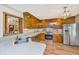 Updated kitchen with modern appliances, ample counter space, and views to a separate living area at 115 W Park Ln, Summerville, SC 29486