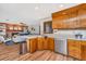 Well-equipped kitchen featuring modern appliances and a view of the cozy living room at 115 W Park Ln, Summerville, SC 29486