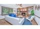 Well-lit living room showcasing a fireplace, built-in shelves, and comfortable seating at 115 W Park Ln, Summerville, SC 29486