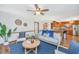 Comfortable living room area featuring a hardwood floor and an opening to the kitchen area at 115 W Park Ln, Summerville, SC 29486