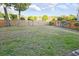 Spacious back yard featuring a well-maintained lawn and a wooden fence for privacy at 116 Marshside Dr, Summerville, SC 29485