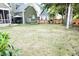 Spacious backyard with new fence, lush lawn, and convenient access to the home's outdoor amenities at 116 Marshside Dr, Summerville, SC 29485