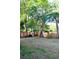 Fenced backyard with grass and mature trees at 116 Marshside Dr, Summerville, SC 29485