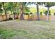 Fenced backyard with grass and mature trees at 116 Marshside Dr, Summerville, SC 29485