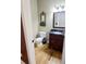 Charming bathroom with wooden vanity and flooring at 116 Marshside Dr, Summerville, SC 29485