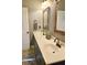 Bathroom featuring double sinks, two mirrors, and tiled floors at 116 Marshside Dr, Summerville, SC 29485