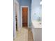 A well-organized bathroom featuring a sink, toilet, and a walk-in closet with built-in shelving at 116 Marshside Dr, Summerville, SC 29485